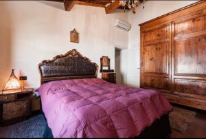 A bed or beds in a room at Casa Costanza