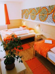 Postel nebo postele na pokoji v ubytování Lótuszvirág Vendégház