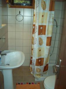 Koupelna v ubytování Mιχαλης Apartments