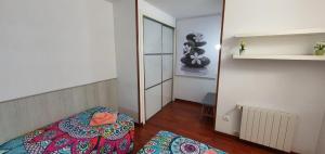 Een bed of bedden in een kamer bij Apartamento Vilallonga