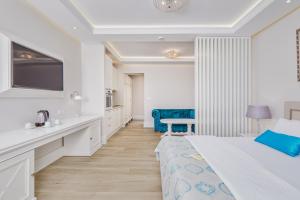 Postel nebo postele na pokoji v ubytování Hotel Libertas