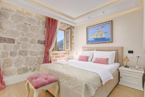 Postel nebo postele na pokoji v ubytování Hotel Libertas