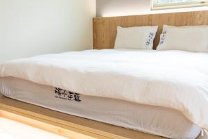 Llit o llits en una habitació de Blue Lagoon