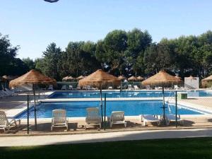 The swimming pool at or close to CARPE DIEM Studio