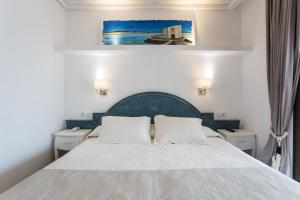 Posteľ alebo postele v izbe v ubytovaní Hotel Bahía