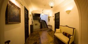 Un televizor și/sau centru de divertisment la Scala Boutique-Hotel