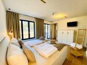 a living room with a couch and a large window at Prora Düne 7 in Binz