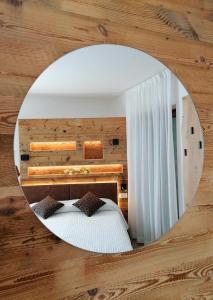 Rúm í herbergi á Albergo Silvana