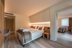 Cama ou camas em um quarto em Hotel Ariston Garden & Spa
