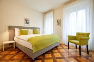Postel nebo postele na pokoji v ubytování Hotel Schmid & Alfa