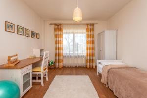 Postel nebo postele na pokoji v ubytování Vila TILA