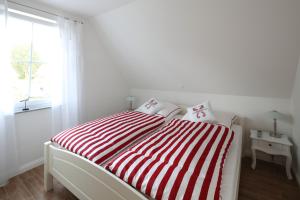 Postel nebo postele na pokoji v ubytování Ferienhaus Lucia