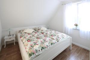 Postel nebo postele na pokoji v ubytování Ferienhaus Lucia