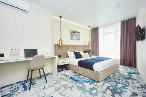 TV a/nebo společenská místnost v ubytování Jupiter Hotel