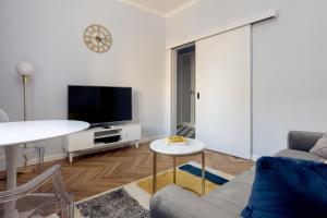 TV a/nebo společenská místnost v ubytování Metro Politechnika Cosy Apartment