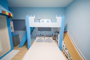 Postel nebo postele na pokoji v ubytování Moonlight Fengqing Homestay
