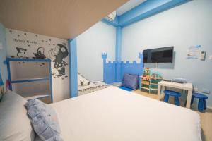 Postel nebo postele na pokoji v ubytování Moonlight Fengqing Homestay