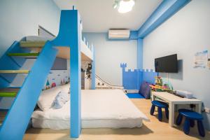 Postel nebo postele na pokoji v ubytování Moonlight Fengqing Homestay