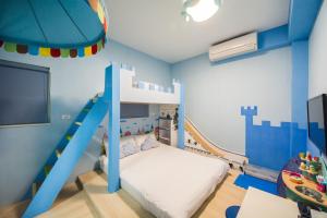 Postel nebo postele na pokoji v ubytování Moonlight Fengqing Homestay
