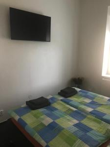 Postel nebo postele na pokoji v ubytování Penzion Na Vápence