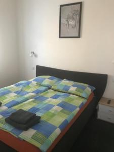 Postel nebo postele na pokoji v ubytování Penzion Na Vápence