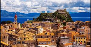 a view of a town with a mountain in the background at City Villa -amazing view in Alepou