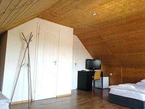 Μια τηλεόραση ή/και κέντρο ψυχαγωγίας στο Manoka Guest House