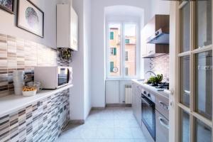 A kitchen or kitchenette at Bellavista Apartment