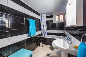 Kylpyhuone majoituspaikassa Manolis Studio