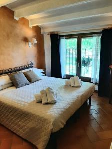 Posteľ alebo postele v izbe v ubytovaní Agriturismo La Perlara - Adults Only