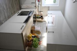 A kitchen or kitchenette at Levendula Nyaraló
