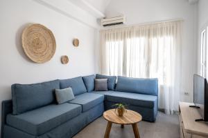 Χώρος καθιστικού στο Thira Gold Suites