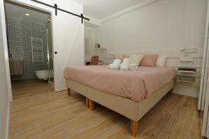 Ein Bett oder Betten in einem Zimmer der Unterkunft Home Sweet Home Main St Pamplona