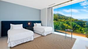 Ένα ή περισσότερα κρεβάτια σε δωμάτιο στο Avalon - 901 Luxurious & Best View 3 BR Amapas +64 φωτογραφίες