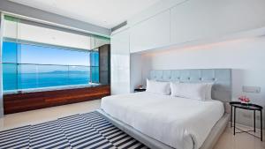 Ένα ή περισσότερα κρεβάτια σε δωμάτιο στο Avalon - 901 Luxurious & Best View 3 BR Amapas