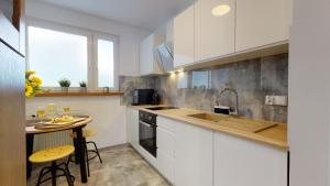Η κουζίνα ή μικρή κουζίνα στο Apartament Kuźnicza
