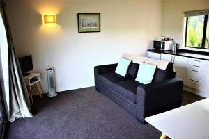 Kuchyň nebo kuchyňský kout v ubytování Duvauchelle Seaside Motel