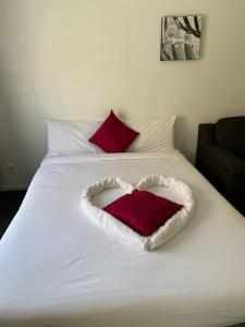 מיטה או מיטות בחדר ב-Baden Lodge