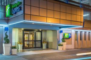 a building with the entrance to a hotel at Holiday Inn Express Philadelphia-Midtown, an IHG Hotel in Philadelphia