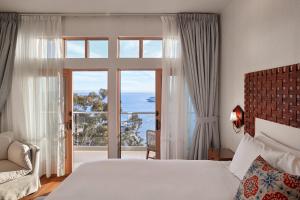 Кровать или кровати в номере Zane Grey Pueblo Hotel