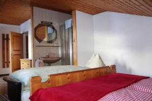A bed or beds in a room at Payrhof