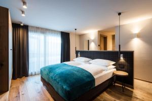 Voodi või voodid majutusasutuse Hotel Pradat toas