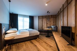 Voodi või voodid majutusasutuse Hotel Pradat toas
