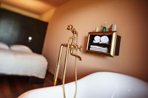 Posteľ alebo postele v izbe v ubytovaní Weingartenhotel Harkamp Südsteiermark