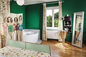 Posteľ alebo postele v izbe v ubytovaní Weingartenhotel Harkamp Südsteiermark