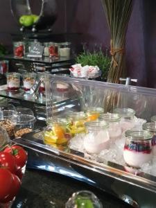 a buffet with many different types of food on display at Central Hotel in Villingen-Schwenningen