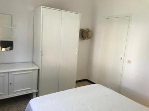 Posteľ alebo postele v izbe v ubytovaní Villa Evisa