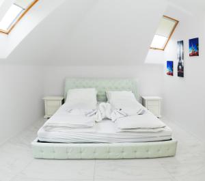Posteľ alebo postele v izbe v ubytovaní Corso Lux Apartman