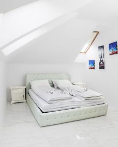 Posteľ alebo postele v izbe v ubytovaní Corso Lux Apartman