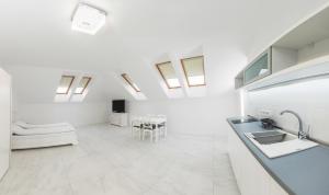 Kuchyňa alebo kuchynka v ubytovaní Corso Lux Apartman